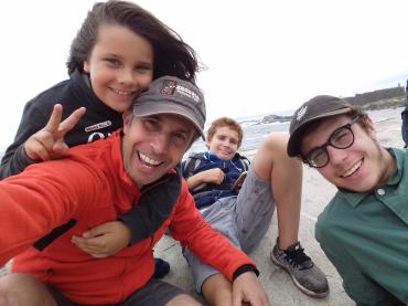 Joao Perre Viana On Beach Smiling With His Children