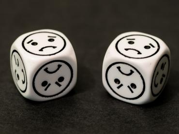 2 White Dice With Sad Faces OOn All sides
