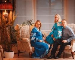 Myron Wasylyk Sitting On Sofa With His Family