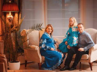 Myron Wasylyk Sitting On Sofa With His Family