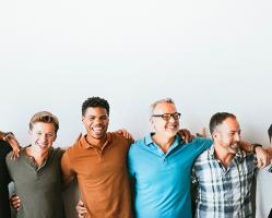 men of different ages and races standing in a-line