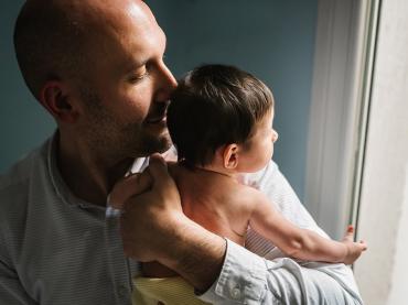 father-hugging-cute-baby