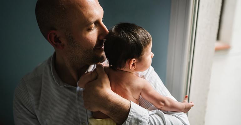 father-hugging-cute-baby