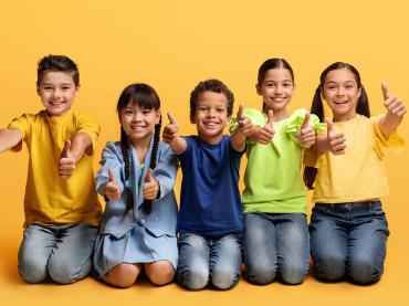 happy-diverse-multietnic-children-showing-thumb-up