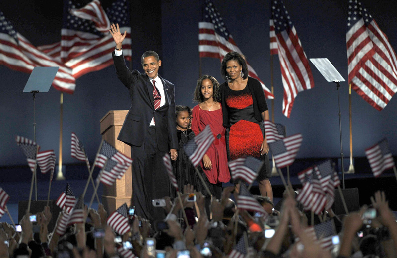 Barack And Michelle Obama On Stage With Daughters