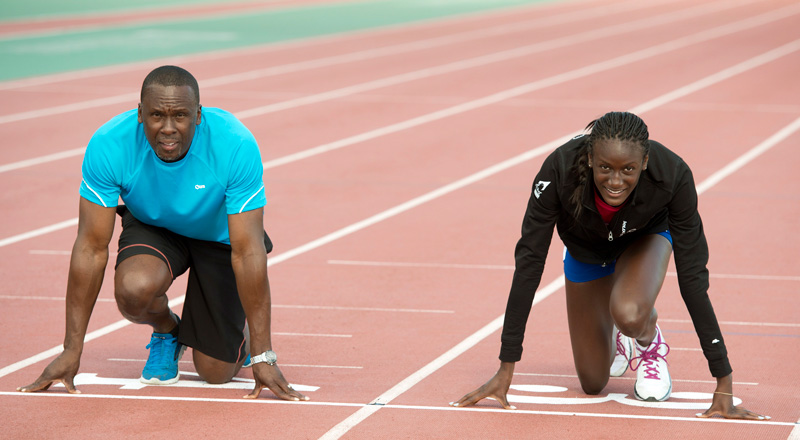 Bruny Surin Kneeling At Starting Line Of Track Course With Daughter Kat Surin