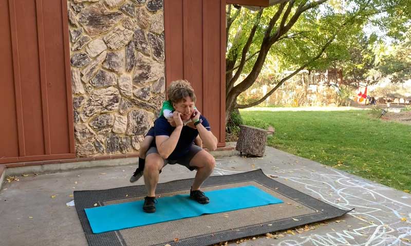 Sorren Harrison of Fit Daddy 365 Doing 5 Squats With Son