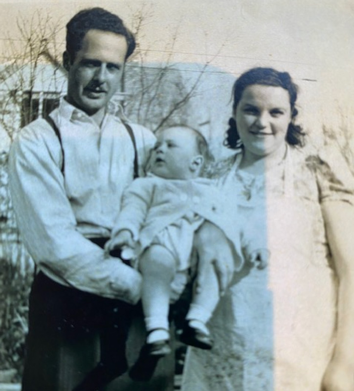 Baby Photograph Of Frank Palmer In Arms of Parents