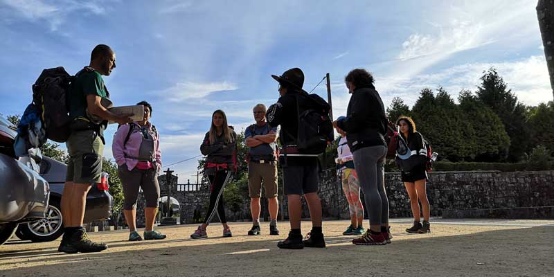 Nuno Santos Fernandes Speaking To Group Of People With Backpacks Before Starting Walk