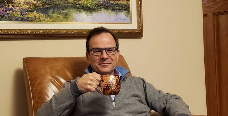 John Boynton Relaxing At Home Having A Cup Off Coffee