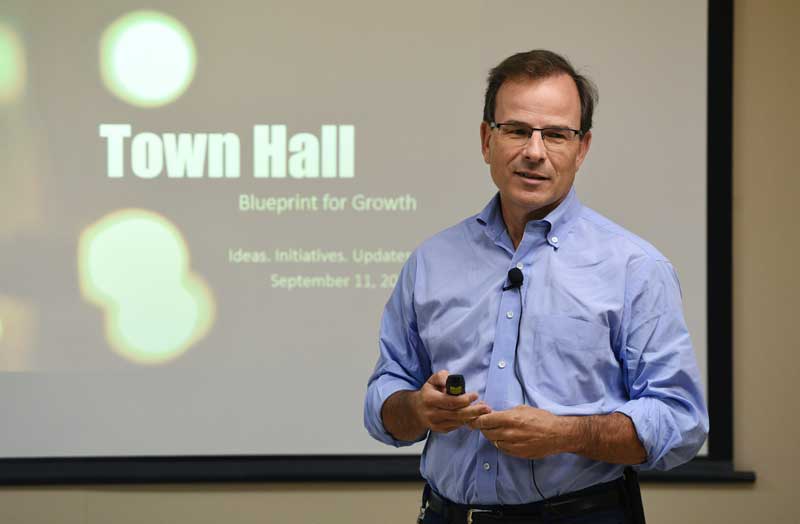 John Boynton Giving A Lecture At A Company Town Hall Meeting