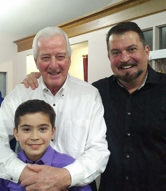 John Vellinga With His Son And Father Posing For Photograph