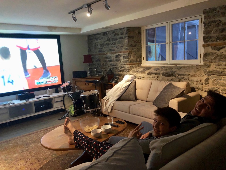 Justin Trudeau And Son Xavier Relaxing On Sofa Warchin Toronto Raptors Game On Television