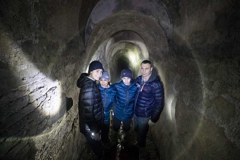 Vitali Klitschko With His Children Discovering Ancient Tunnels Of The Lavra Monastery In Kyiv Ukraine