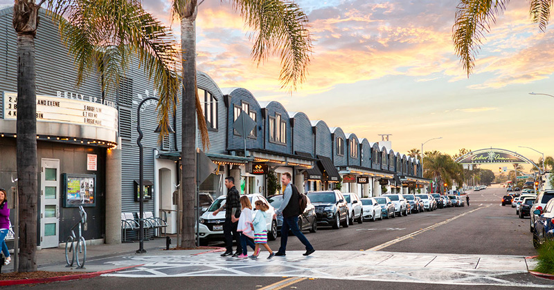 Cedros Fashion District Street View With Family Crossing Street