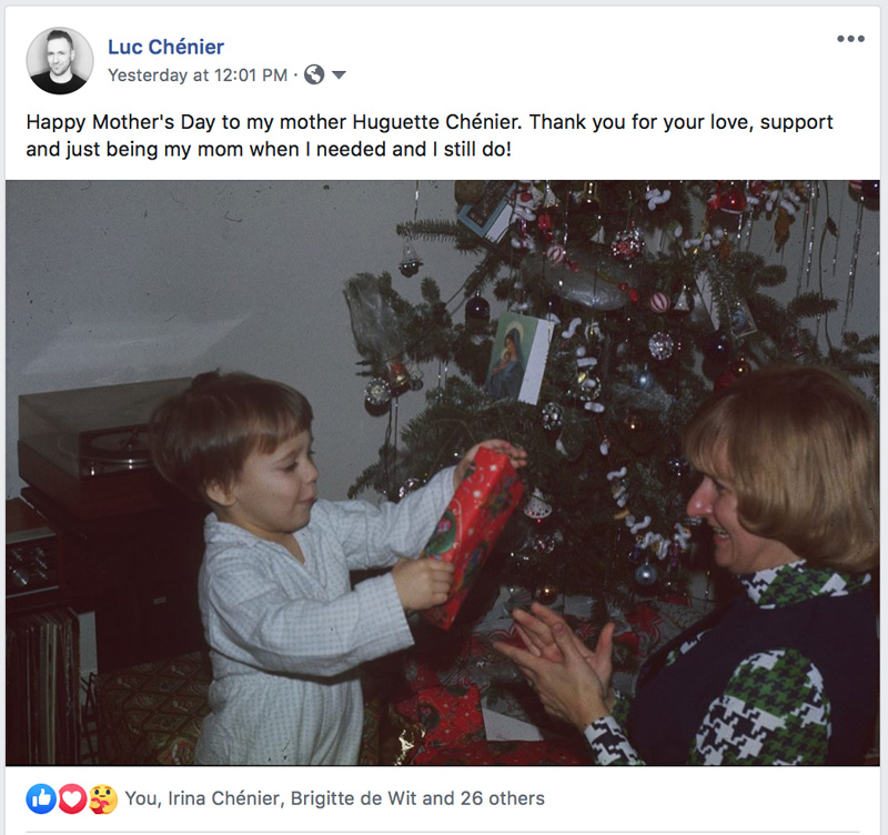 Photo of Young Luc Chenier Receiving Present With His Mother At Christmas