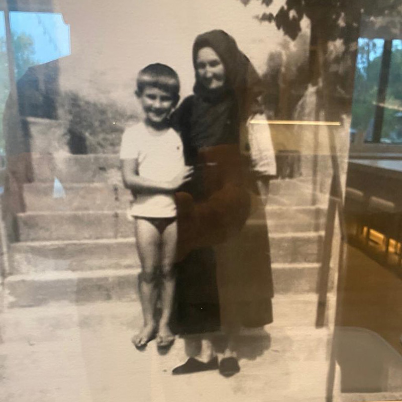 Old Black And White Photo Of Robert Herjavec With His Grand-Mother